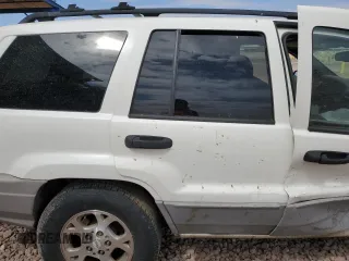 2000 Jeep Grand Cherokee Laredo with VIN 1J4G248S4YC222194, listed as a Copart auction lot 53809825 with Not provided miles and Salvage title. Bid and sale history available at DreamBid. Image 11.