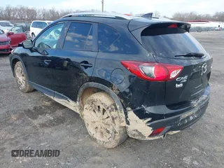 2016 Mazda CX-5 Touring with VIN JM3KE4CY7G0602267, listed as a IAAI auction lot 41854213 with 134,170 mi miles and . Bid and sale history available at carsss.com. Image 3.
