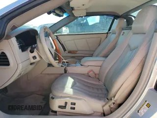 2005 Cadillac XLR z VIN 1G6YV34A455601742, wystawiony jako Copart lot #77878544 z przebiegiem Nie podano mil oraz Szkody całkowita. Historia ofert i sprzedaży dostępna na DreamBid. Obrazek 10.