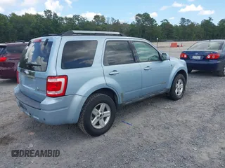 2008 Ford Escape Hybrid z VIN 1FMCU49H88KD98832, wystawiony jako IAAI lot #42656141 z przebiegiem 289 930 mil mil oraz . Historia ofert i sprzedaży dostępna na DreamBid. Obrazek 4.