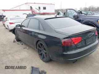 2013 Audi A8 L 3.0L with VIN WAURGAFD4DN013035, listed as a IAAI auction lot 41591570 with 152,859 mi miles. Bid and sale history available at carsss.com. Image 3.