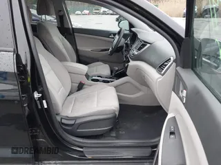 2018 Hyundai Tucson SE with VIN KM8J23A48JU794382, listed as a IAAI auction lot 41947971 with 69,615 mi miles. Bid and sale history available at carsss.com. Image 5.