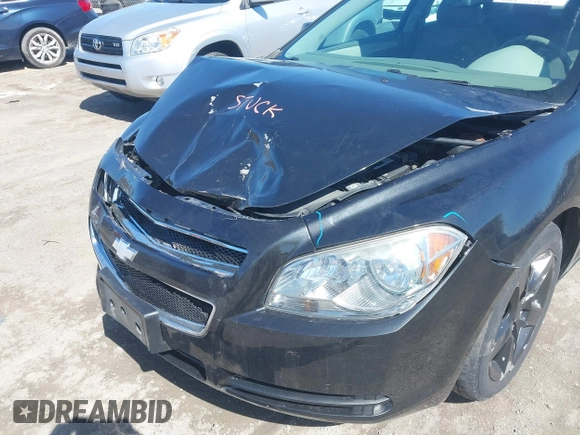 2012 Chevrolet Malibu 1LS with VIN 1G1ZB5E04CF180746, listed as a IAAI auction lot 41866051 with 140,002 mi miles and . Bid and sale history available at DreamBid. Image 6.