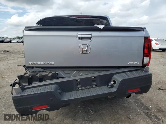 2023 Honda Ridgeline RTL-E with VIN 5FPYK3F70PB018858, listed as a Copart auction lot 64210205 with 16,562 mi miles and Salvage title. Bid and sale history available at DreamBid. Image 6.