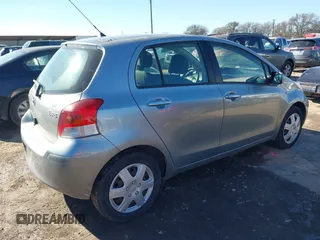 2010 Toyota Yaris with VIN JTDKT4K38A5285260, listed as a IAAI auction lot 41476373 with 104,358 mi miles. Bid and sale history available at carsss.com. Image 4.