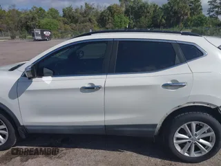 2017 Nissan Rogue SV z VIN JN1BJ1CP7HW007270, wystawiony jako IAAI lot #41908931 z przebiegiem 94 373 mil mil oraz . Historia ofert i sprzedaży dostępna na DreamBid. Obrazek 15.