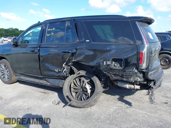 2023 Cadillac Escalade 4WD Sport z VIN 1GYS4EKL2PR351882, wystawiony jako IAAI lot #41555895 z przebiegiem 58 703 mil mil oraz . Historia ofert i sprzedaży dostępna na DreamBid. Obrazek 6.