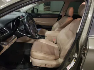 2015 Subaru Outback Limited with VIN 4S4BSBJCXF3295604, listed as a Copart auction lot 52350705 with 165,359 mi miles and Salvage Title. Bid and sale history available at DreamBid. Image 7.