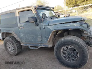 2014 Jeep Wrangler Sport with VIN 1C4AJWAG0EL326774, listed as a IAAI auction lot 41691784 with 98,696 mi miles and . Bid and sale history available at DreamBid. Image 14.