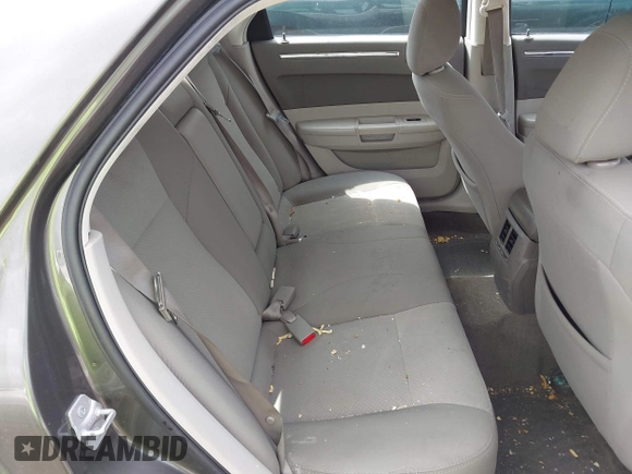 2009 Chrysler 300 LX with VIN 2C3KA43D49H558006, listed as a IAAI auction lot 42178195 with 208,864 mi miles and . Bid and sale history available at DreamBid. Image 8.