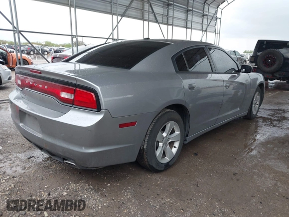 2014 Dodge Charger SE with VIN 2C3CDXBG5EH363292, listed as a IAAI auction lot 41888279 with 129,128 mi miles. Bid and sale history available at carsss.com. Image 4.