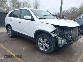2012 Kia Sorento EX with VIN 5XYKU4A6XCG290754, listed as a IAAI auction lot 41918932 with 190,679 mi miles and . Bid and sale history available at carsss.com. Image 1.