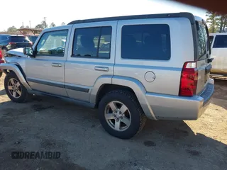 2007 Jeep Commander Sport z VIN 1J8HH48K77C587615, wystawiony jako IAAI lot #41149777 z przebiegiem 167 871 mil mil oraz . Historia ofert i sprzedaży dostępna na DreamBid. Obrazek 3.
