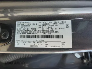2023 Ford F-150 XL with VIN 1FTEW1CP4PKD21685, listed as a Copart auction lot 54992615 with 27,252 mi miles and Salvage title. Bid and sale history available at DreamBid. Image 12.