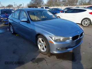 2013 BMW 3 Series 320i with VIN WBA3B1C56DK128089, listed as a IAAI auction lot 41332091 with 101,155 mi miles. Bid and sale history available at carsss.com. Image 1.