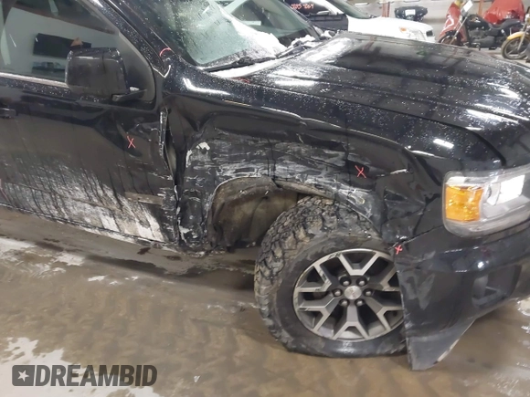 2016 GMC Canyon 4WD SLE with VIN 1GTG6CE30G1365705, listed as a IAAI auction lot 41836373 with 146,111 mi miles and . Bid and sale history available at carsss.com. Image 6.