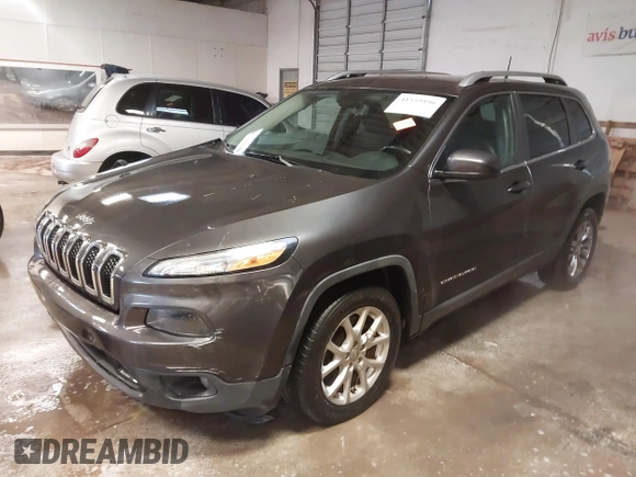 2016 Jeep Cherokee Altitude z VIN 1C4PJLCB0GW338970, wystawiony jako IAAI lot #41559196 z przebiegiem 129 366 mil mil oraz . Historia ofert i sprzedaży dostępna na DreamBid. Obrazek 17.