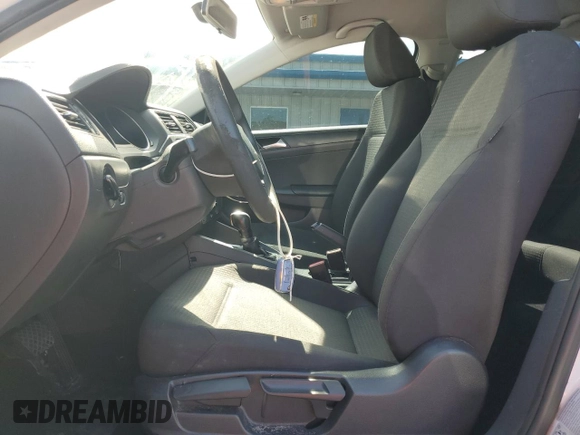 2015 Volkswagen Jetta S with VIN 3VW2K7AJ9FM323047, listed as a Copart auction lot 59098565 with 169,648 mi miles and Salvage title. Bid and sale history available at DreamBid. Image 7.