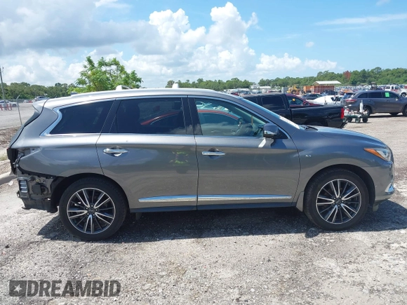 2019 Infiniti QX60 Pure with VIN 5N1DL0MNXKC512120, listed as a IAAI auction lot 42552676 with 88,944 mi miles and . Bid and sale history available at DreamBid. Image 13.