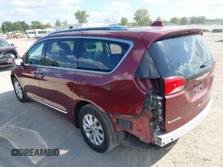 2018 Chrysler Pacifica Touring L with VIN 2C4RC1BG0JR279665, listed as a IAAI auction lot 40336389 with 80,835 mi miles and . Bid and sale history available at DreamBid. Image 3.
