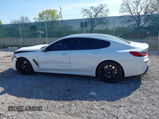 2022 BMW 8 Series M850i with VIN WBAGV8C09NCH15245, listed as a IAAI auction lot 42053154 with 26,384 mi miles and . Bid and sale history available at DreamBid. Image 14.