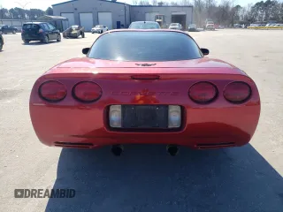 2004 Chevrolet Corvette with VIN 1G1YY22G445128857, listed as a Copart auction lot 42604495 with 143,805 mi miles and Salvage Title. Bid and sale history available at carsss.com. Image 6.