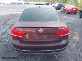 2013 Volkswagen Passat TDI SEL Premium with VIN 1VWCN7A33DC031549, listed as a IAAI auction lot 40313029 with 104,184 mi miles. Bid and sale history available at carsss.com. Image 16.