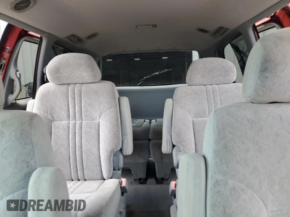 2000 Toyota Sienna LE with VIN 4T3ZF13C3YU284605, listed as a Copart auction lot 79405404 with 137,213 mi miles and Salvage Title. Bid and sale history available at carsss.com. Image 10.