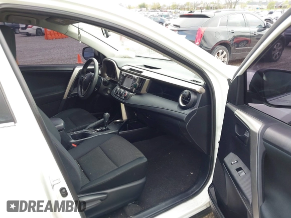 2014 Toyota RAV4 LE with VIN JTMBFREV2EJ006965, listed as a IAAI auction lot 41961470 with 194,881 mi miles and . Bid and sale history available at DreamBid. Image 5.