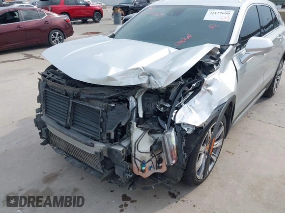 2019 Cadillac XT4 FWD Premium Luxury z VIN 1GYFZCR42KF189610, wystawiony jako IAAI lot #42137690 z przebiegiem 92 502 mil mil oraz . Historia ofert i sprzedaży dostępna na DreamBid. Obrazek 6.