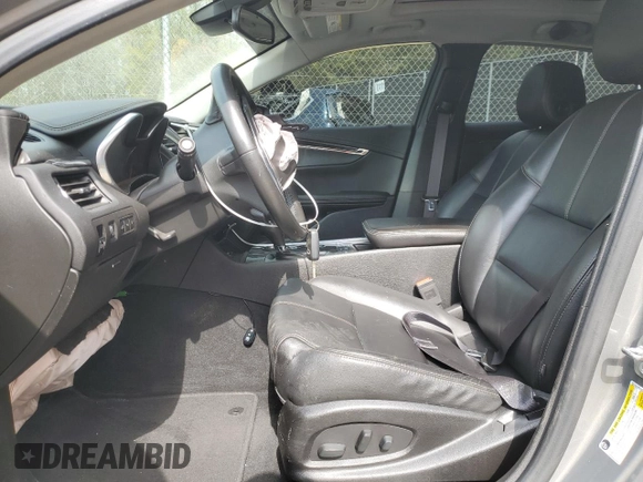 2017 Chevrolet Impala LT with VIN 2G1105S37H9196814, listed as a Copart auction lot 52831285 with 64,749 mi miles and Salvage Title. Bid and sale history available at DreamBid. Image 7.