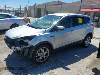 2013 Ford Escape SEL z VIN 1FMCU9H93DUA34811, wystawiony jako IAAI lot #42227559 z przebiegiem 126 495 mil mil oraz . Historia ofert i sprzedaży dostępna na DreamBid. Obrazek 18.