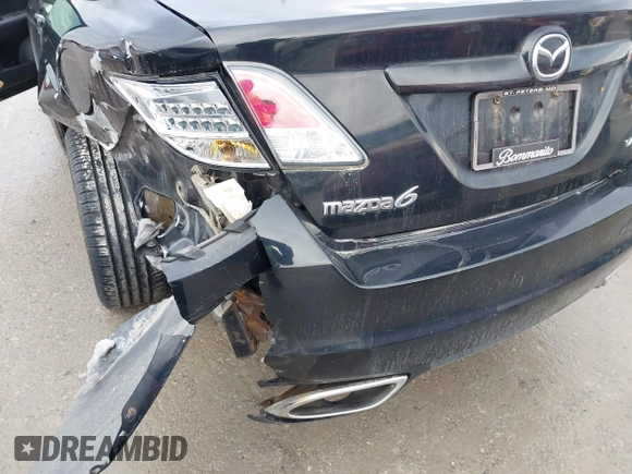 2009 Mazda 6 S Grand Touring with VIN 1YVHP82B695M11134, listed as a IAAI auction lot 41466574 with 225,300 mi miles and . Bid and sale history available at DreamBid. Image 18.