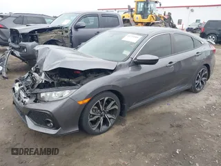 2019 Honda Civic Si z VIN 2HGFC1E52KH701117, wystawiony jako IAAI lot #41722505 z przebiegiem 64 085 mil mil oraz . Historia ofert i sprzedaży dostępna na DreamBid. Obrazek 17.