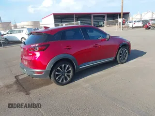2019 Mazda CX-3 Grand Touring with VIN JM1DKFD71K0427650, listed as a IAAI auction lot 42058069 with 67,688 mi miles and . Bid and sale history available at DreamBid. Image 4.