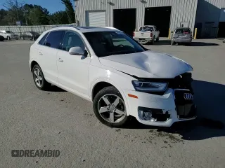 2015 Audi Q3 Premium Plus with VIN WA1BFCFS7FR014199, listed as a Copart auction lot 81987154 with 62,071 mi miles and Salvage title. Bid and sale history available at DreamBid. Image 14.
