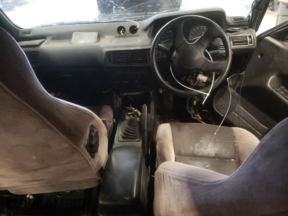 1988 Mitsubishi Galant with VIN E39A0010917, listed as a Copart auction lot 44421775 with 14,813 mi miles and Salvage Title. Bid and sale history available at DreamBid. Image 8.