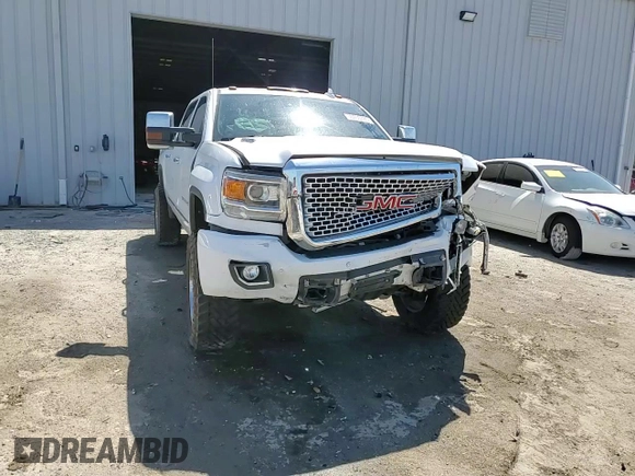 2016 GMC Sierra 2500HD Denali z VIN 1GT12UE84GF106026, wystawiony jako Copart lot #50755335 z przebiegiem 127 039 mil mil oraz Szkoda całkowita • Salvage title. Historia ofert i sprzedaży dostępna na DreamBid. Obrazek 13.