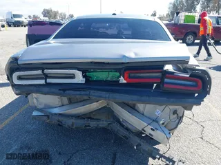 2017 Dodge Challenger SXT Plus with VIN 2C3CDZAG5HH502354, listed as a IAAI auction lot 41740550 with 131,860 mi miles. Bid and sale history available at carsss.com. Image 6.