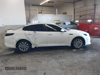 2016 Kia Optima SX Turbo with VIN 5XXGW4L23GG016526, listed as a IAAI auction lot 41428139 with 112,603 mi miles and . Bid and sale history available at carsss.com. Image 13.