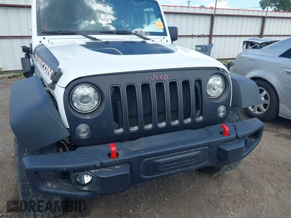 2017 Jeep Wrangler Unlimited Rubicon Recon with VIN 1C4BJWFG1HL693572, listed as a IAAI auction lot 42601855 with 64,342 mi miles and . Bid and sale history available at DreamBid. Image 12.