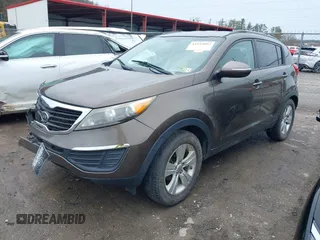 2011 Kia Sportage LX with VIN KNDPB3A20B7024111, listed as a IAAI auction lot 41945892 with 139,605 mi miles and . Bid and sale history available at carsss.com. Image 2.