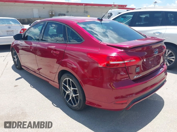 2016 Ford Focus SE z VIN 1FADP3F28GL237888, wystawiony jako IAAI lot #42564140 z przebiegiem 143 210 mil mil oraz . Historia ofert i sprzedaży dostępna na DreamBid. Obrazek 3.