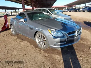 2013 Mercedes-Benz SLK-Class SLK 250 with VIN WDDPK4HA9DF058128, listed as a IAAI auction lot 41809272 with 76,860 mi miles. Bid and sale history available at carsss.com. Image 1.