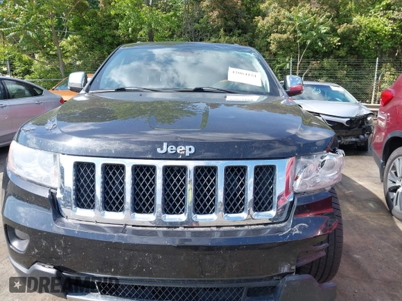 2013 Jeep Grand Cherokee Overland with VIN 1C4RJECT3DC526005, listed as a IAAI auction lot 42064151 with 112,777 mi miles and . Bid and sale history available at DreamBid. Image 12.