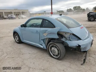 2012 Volkswagen Beetle 2.5L w/Sun PZEV with VIN 3VWJP7AT1CM662704, listed as a Copart auction lot 63332274 with 100,059 mi miles and Salvage Title. Bid and sale history available at carsss.com. Image 2.