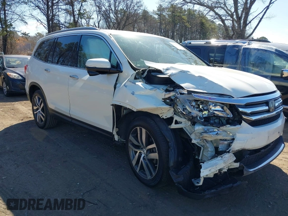 2017 Honda Pilot Touring z VIN 5FNYF6H99HB089121, wystawiony jako IAAI lot #41896878 z przebiegiem 145 330 mil mil oraz . Historia ofert i sprzedaży dostępna na DreamBid. Obrazek 1.