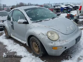 2004 Volkswagen New Beetle Coupe GL with VIN 3VWBK31C44M422057, listed as a IAAI auction lot 41978706 with 159,854 mi miles. Bid and sale history available at carsss.com. Image 1.