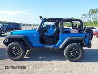 2015 Jeep Wrangler Sport z VIN 1C4AJWAG8FL550859, wystawiony jako IAAI lot #42154946 z przebiegiem 143 658 mil mil oraz . Historia ofert i sprzedaży dostępna na DreamBid. Obrazek 15.