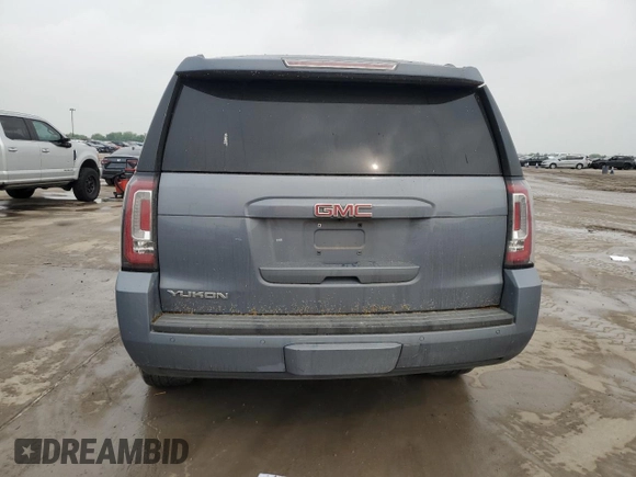 2016 GMC Yukon SLT z VIN 1GKS2BKC0GR162789, wystawiony jako Copart lot #51579075 z przebiegiem 159 823 mil mil oraz Szkoda całkowita • Salvage title. Historia ofert i sprzedaży dostępna na DreamBid. Obrazek 6.